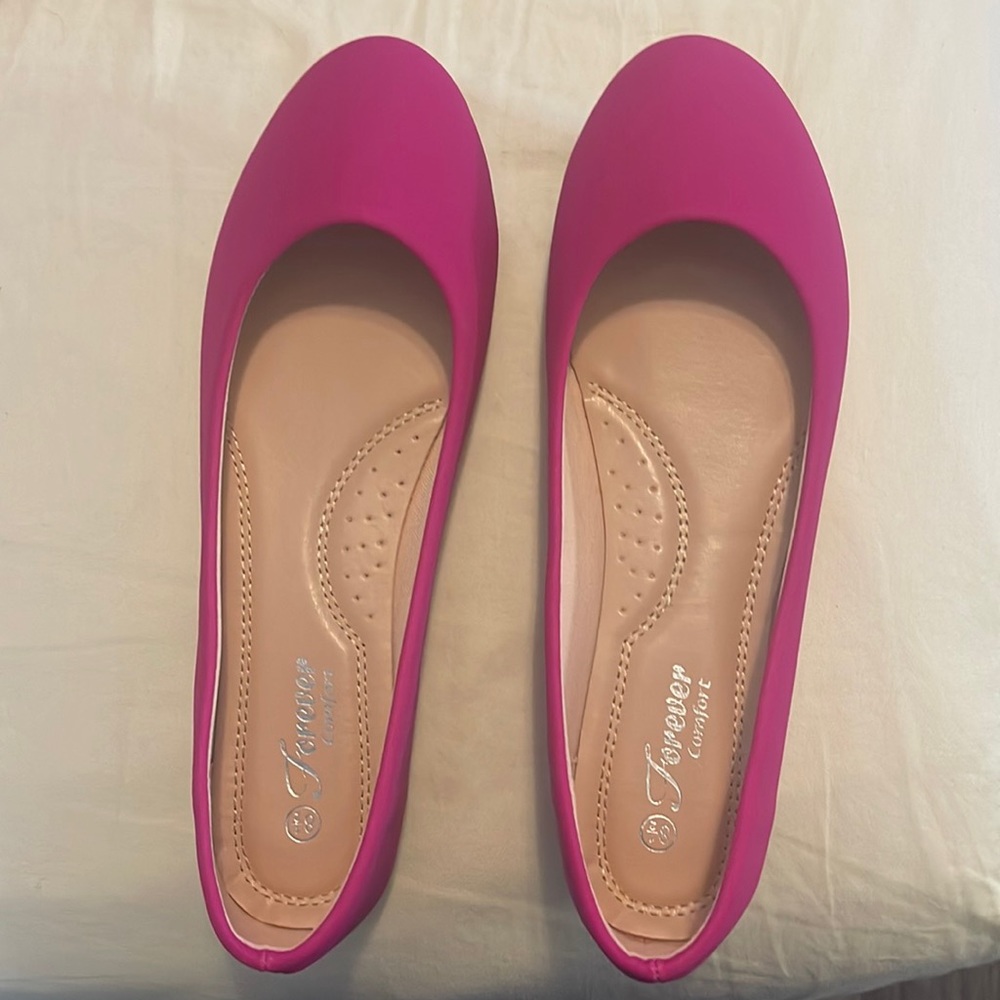 Pink flats 8.5